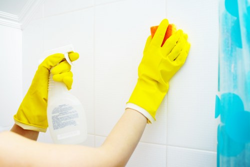 Local cleaner arranging supplies for a property clean in the BR1 area